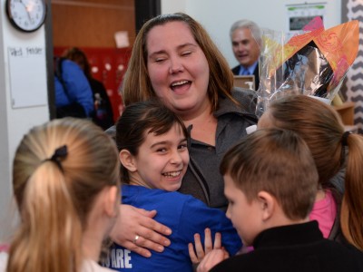 Samatha Morgan hugged by students