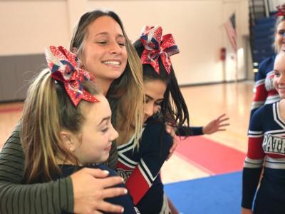 Secaucus 2017 Toni Ann Palmisano hug cheerleaders