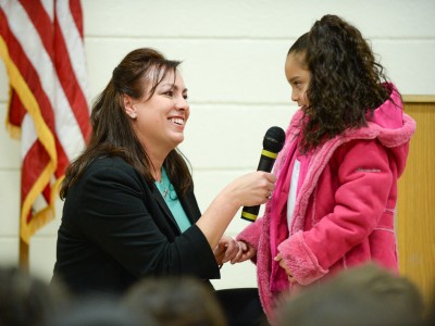 Shannon Ryan Hanna Skandera and student