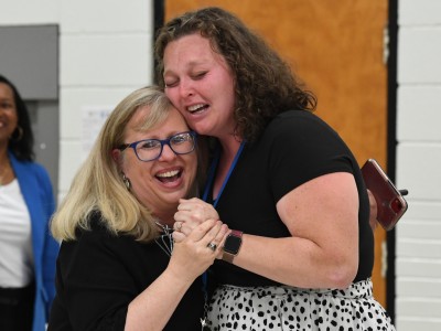 TJE Kamisha Burlingame hugs principal