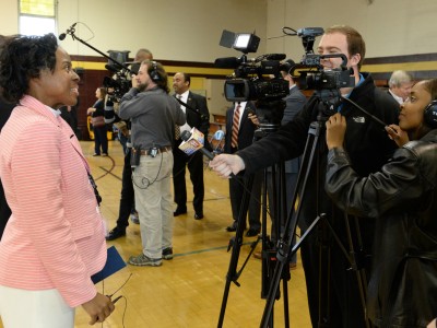 Talking to reporters