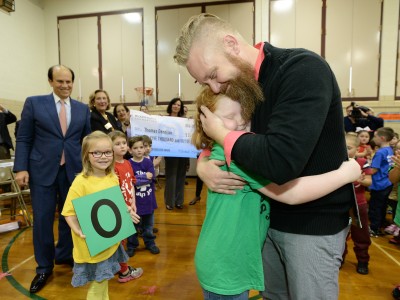 Thomas Dennison hugs daughter Sami