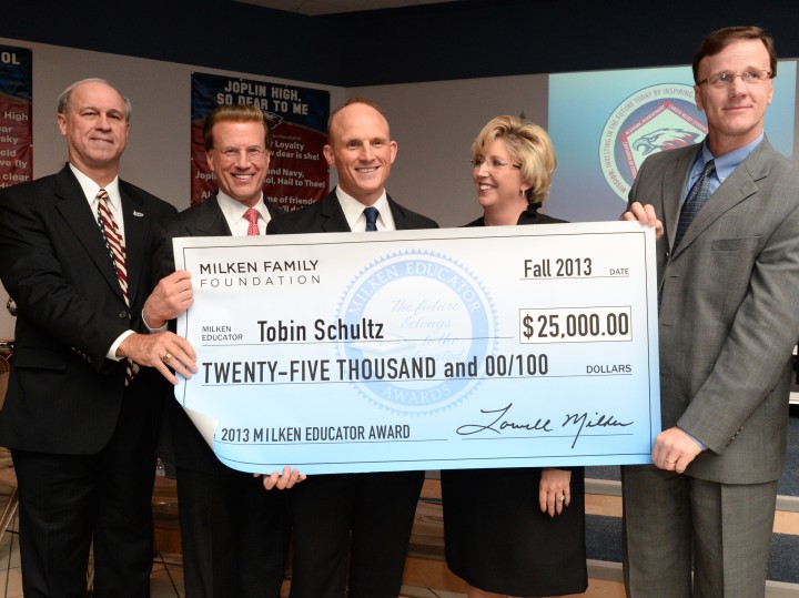 Tobin Schultz group shot with Lowell Milken