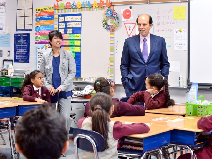 Tracy Espiritu and Mike Milken teaching class