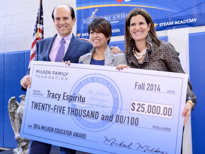 Tracy Espiritu with Mike Milken Mary Pat Christie and 25000 check