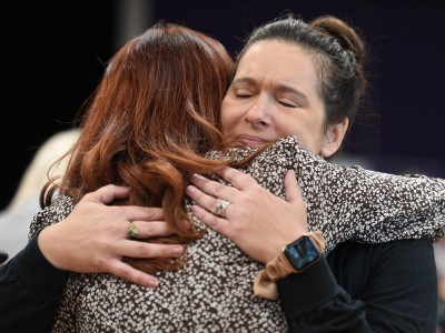 Wachter Erica Quale Kirsten Baesler hug
