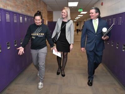 Wachter Erica Quale walks to classroom