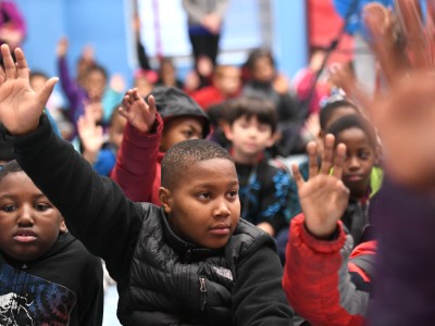 Weinland Park students hands up