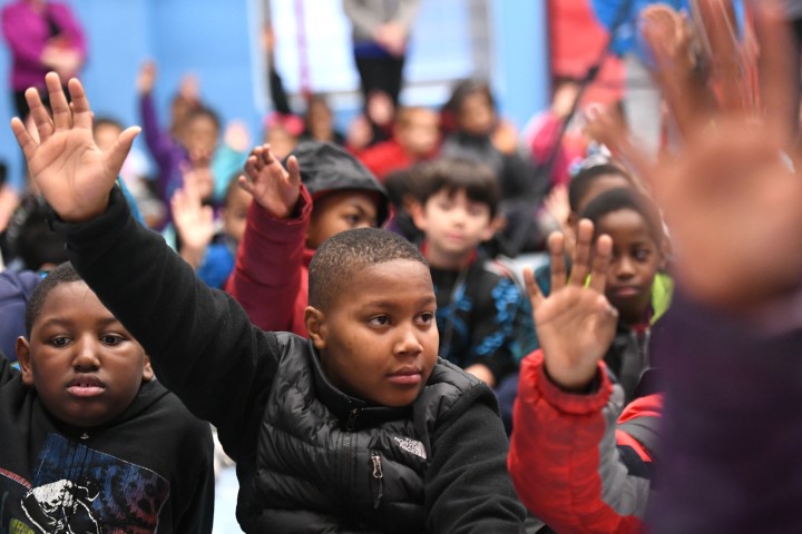 Weinland Park students hands up