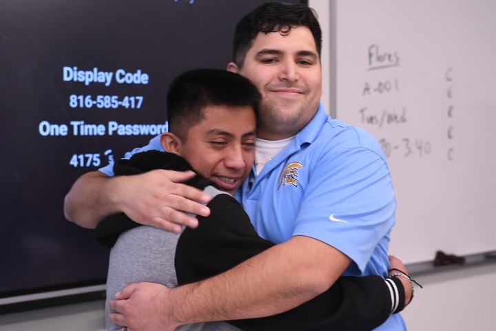 greeley caleb flores student hug