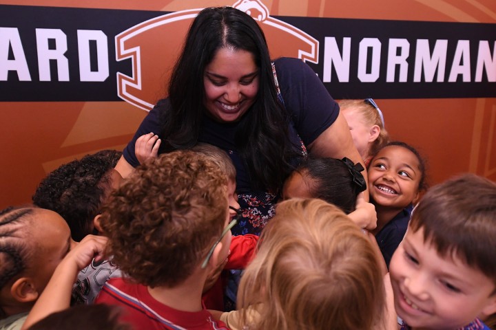 nhes olivia joseph hugging students