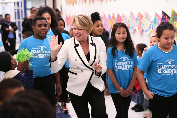 pes asia cunningham truitt greets students