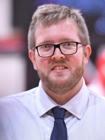 NHS Adam Wolfe bio