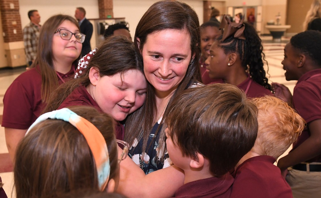 CIS ashley davis student hug