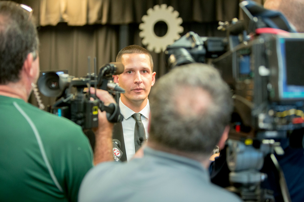 Lukas Hefty talks with reporters 1000w