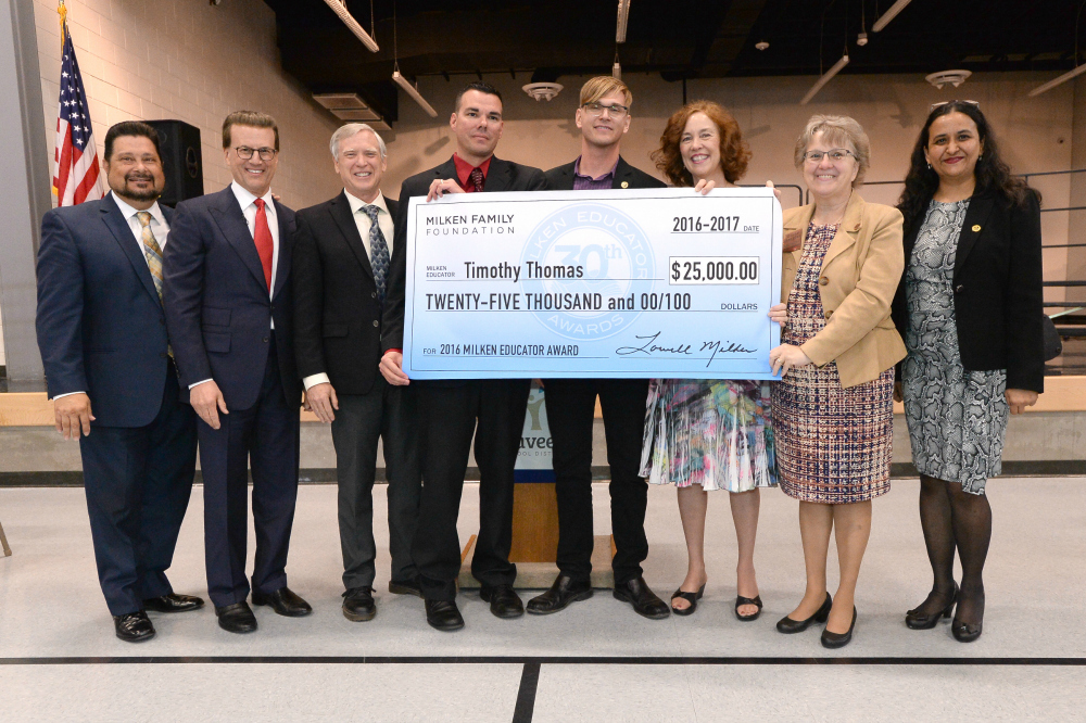 Timothy Thomas check with veteran Milken Educators 1000w