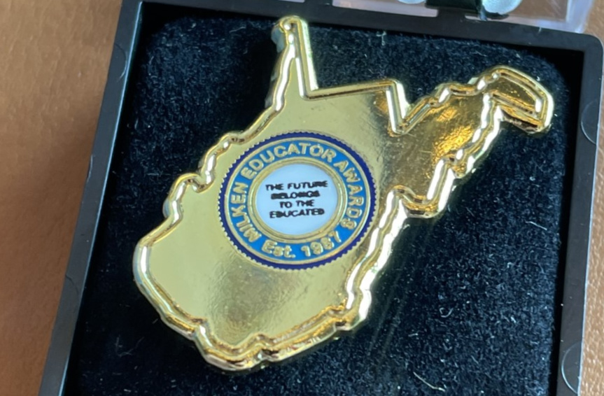 Gold metal West Virginia Milken Educator pin