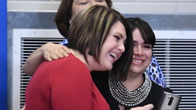 Amber Simpson with colleagues 1000w