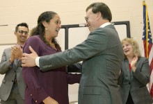 Lowell Milken congratulates Aimee Schade